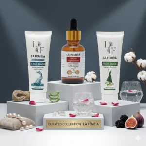 The Anti-Aging Set skincare routine bundle by LaFemeia featuring Hydrating Face Wash, Retinol Night Serum, and Facial Mask on white marble plinths with cotton props in Pakistan.